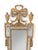 A refined pair of late 18th-century Italian Neoclassical giltwood mirrors retaining their original mirror plates. Each...