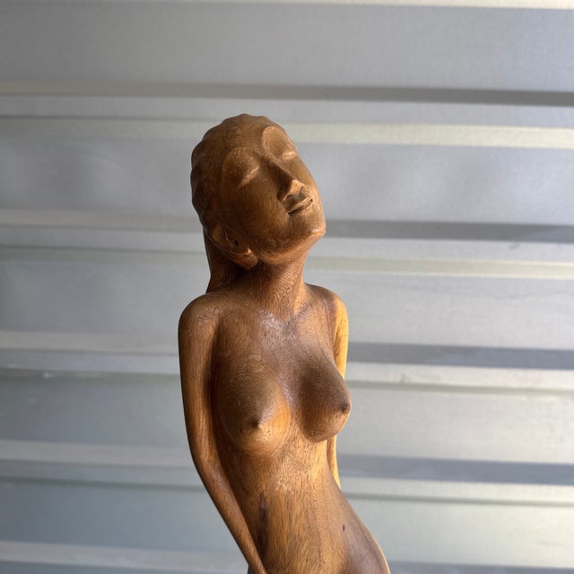 Stunning wood carved sculpture of a nude woman. Unmarked. Stands 29.5” in height. Beautiful condition free from any broken...