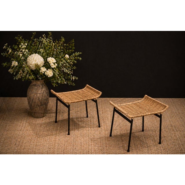 Designed by Carlo Hauner in the 1950s and produced by Forma, this elegant pair of stools exemplifies the lightness and...