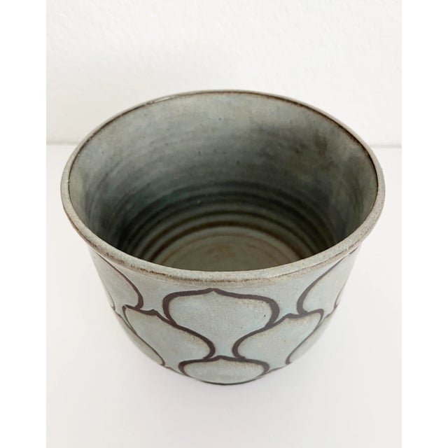 Japanese style ceramic flower planter pot with stylized lotus flower pattern. Handmade with applied glaze finish in...