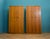 A mid-century two-door wardrobe in walnut, with a slightly deeper tone and straight grain. Integrated oval handles. Raised...