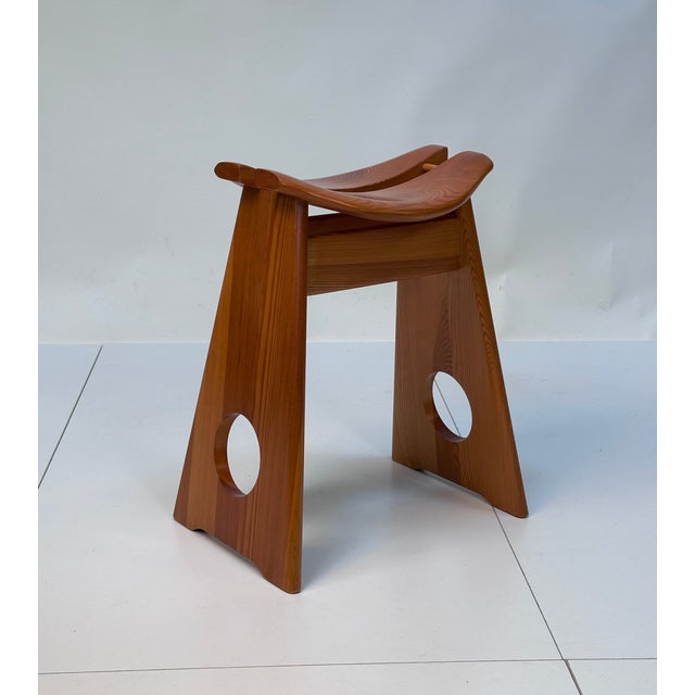 An impressive Swedish modern example of brutalist design in solid pine wood. This iconic sculptural stool was created by...