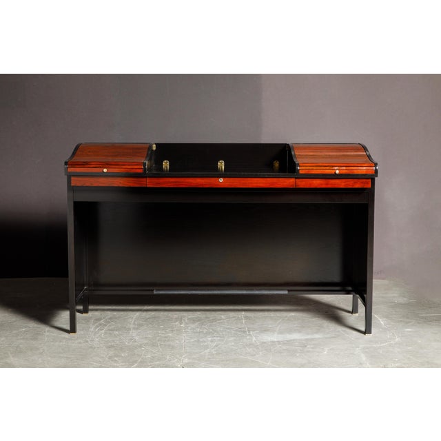 This spectacular fully restored and sought-after model #452 'Roll Top' desk was designed by Edward Wormley for Dunbar and...