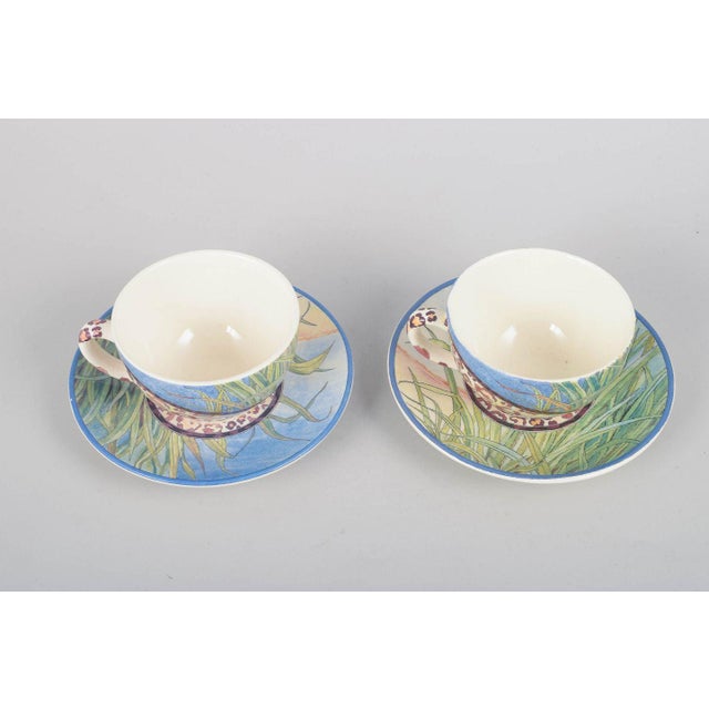 Gien "Savane", pair of coffee cups with matching saucers. Pair of faience coffee cups with matching saucers in the Savane...