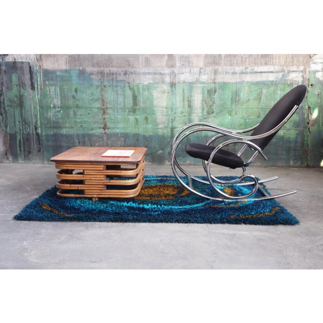 Gorgeous polished bent chrome frame, and black velour upholstered seat and back. Authentic 1970s vintage acquired from the...