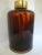 Stunning large scale striated glass table lamp in a rich tones similar to tortoise shell of root beer, dark amber, or...