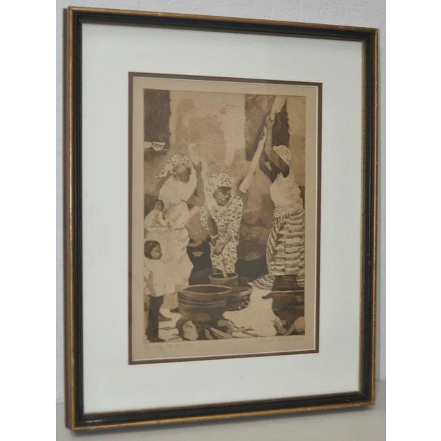 "Pounding Fou Fou" Limited Edition Etching by Lisbeth Hamlin c.1980 A wonderful etching of women in Kenya pounding Fufu, a...