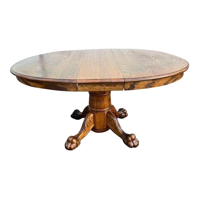 Mid 20th Century Vintage Solid Oak Single Pedestal Round Dining Table With Leaf. For Sale