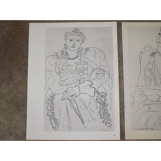 This pair of vintage mid 20th century modernist lithographs (offset) depicts two of Henri Matisse's (France 1869-1954)...