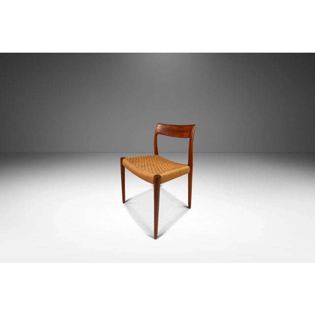 Enhance your dining space with this exquisite set of six chairs designed by Niels O. Møller for J.L. Møllers Møbelfabrik,...