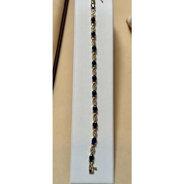 8Ct Natural Oval Blue Sapphire Tennis Bracelet 14 Karat Yellow Gold, 7 Inch Long For Sale - Image 13 of 18