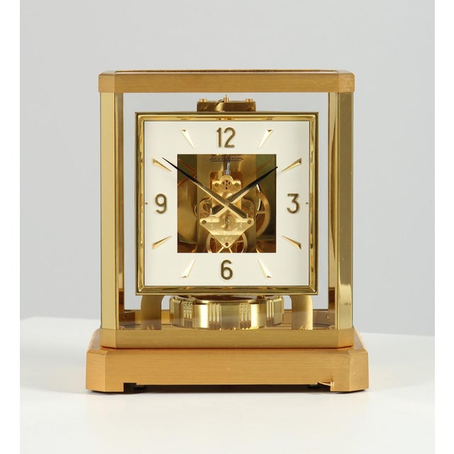 Atmos clock with square dial in full-set switzerland gold-plated brass year of manufacture 1963 dimensions: h x w x d: 23...