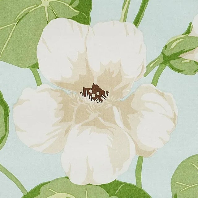 This big, romantic floral wallcovering is based on a 1930s original and feels unexpectedly au courant, thanks to a...