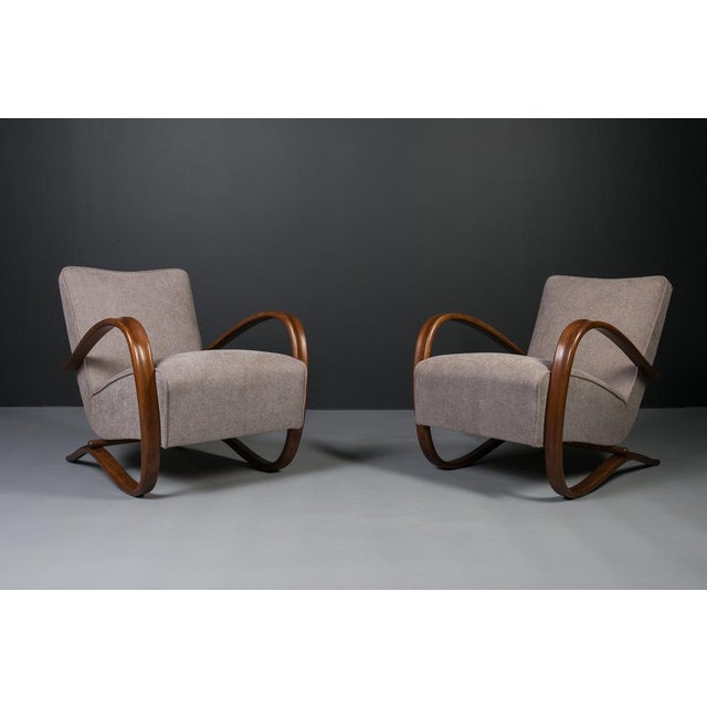 Set of two Art Deco armchairs designed by famous Jindrich Halabala in 1930s in Czechoslovakia. One of his iconic models,...
