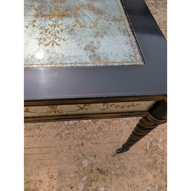 This is a vintage Lillian August for Drexel Heritage ebonite's eglomise side table/accent table featuring a miirrored top...
