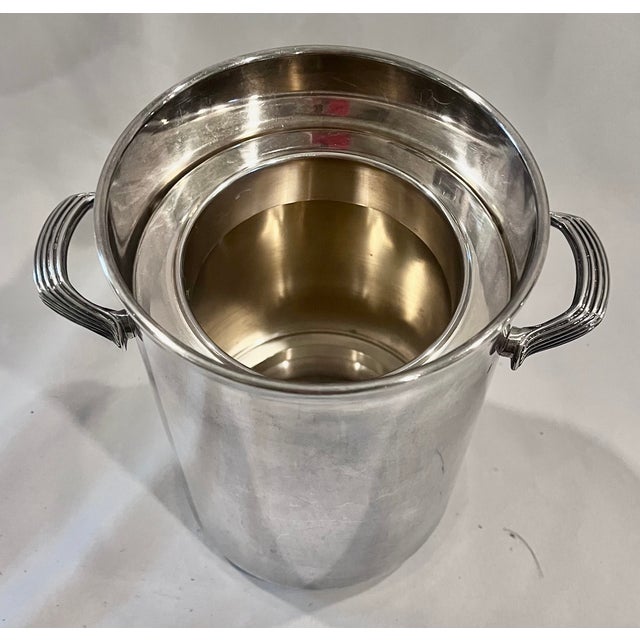 An exceptional and complete mid-century French silver-plated champagne or wine ice bucket set crafted by the renowned...