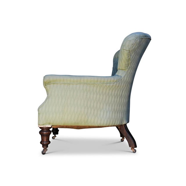Victorian Button Tufted Green Upholstered Armchair In The Style of Howard and Sons with Mahogany Legs and Porcelain...