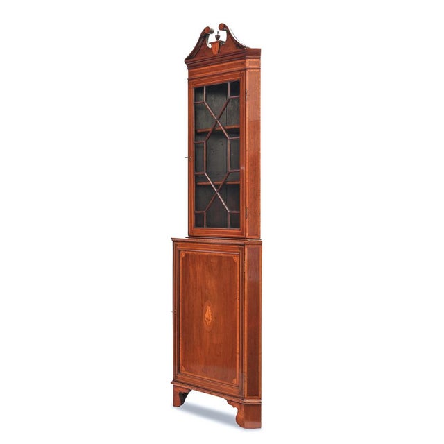 Corner cabinet, Georgian, England, circa 1800, Mahogany, glazed upper section with bracing, Hinged doors at the top and...