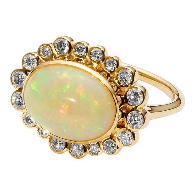 Syna Yellow Gold Ethiopian Opal Oval Ring with Diamonds For Sale