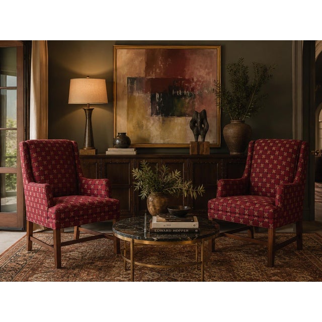 Elegant pair of vintage Hickory Chair Company traditional wingback armchairs featuring tall upholstered backs, gently...