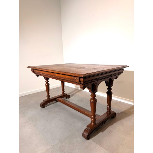 ring timeless craftsmanship into your home with this beautiful antique solid oak draw-leaf dining table. Featuring richly...