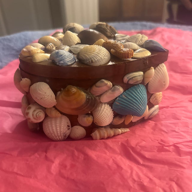 This exquisite vintage heart-shaped trinket and keepsake box is meticulously encrusted by hand with a mosaic of authentic...