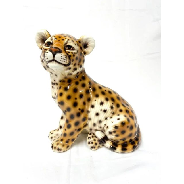 1970's Italian Ceramic Baby Leopard Sculpture. Made in Italy . Collectible and decorative. Dimensions: Height: 11.5 in...