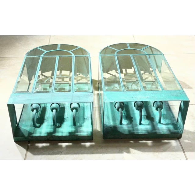 Bring a touch of historic charm and sophistication to your home with this exquisite pair of vintage solid brass wall...