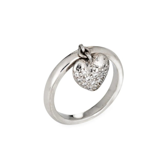 Finely detailed pre owned Tiffany & Co pave diamond heart charm ring crafted in platinum. Diamonds are pave set into the...