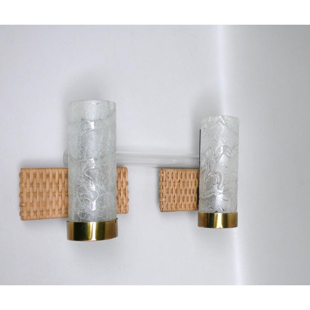 A few elegant and at the same time modern wall lights, made in the 1960s, by Doria. The lights impress with the...