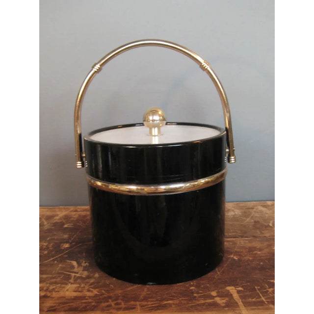 What a hot piece to add to your bar cart! This classic Gentry ice bucket will add style for all your serving needs. The...