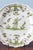 Diameter: 25 cm Height: 2.5 cm Slight wear throughout and minor glaze losses to the edge, commensurate with age. A minor...