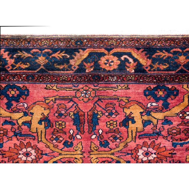 A striking early 20th century Persian Lilihan rug with the most beautiful field with myriad stylized flower and leaves...