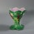 George Jones Majolica sweetmeat dish which features pond lilies and bulrushes. Pink interior version. Colouration: green,...