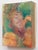 The artwork features a complex interplay of human faces, layered in translucent hues of green, orange, and gold, creating...