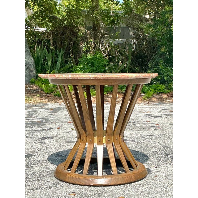 Presenting a truly iconic piece of American design: this Vintage Edward Wormley for Dunbar Stone Top Side Table. A...
