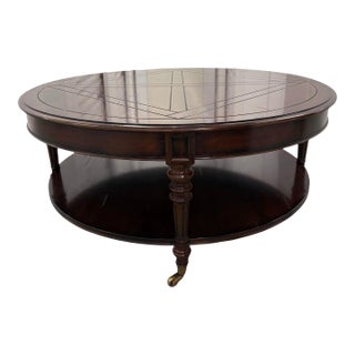 Round Inlaid Wood Two-Tier Coffee Table on Brass Casters For Sale