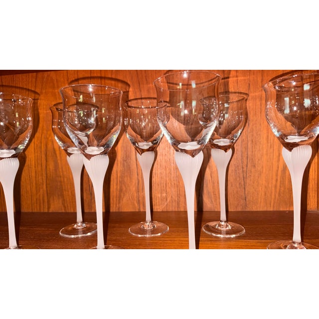 Elevate your next gathering with this exquisite set of seven vintage wine glasses from Mikasa in the timeless "Sea Mist"...