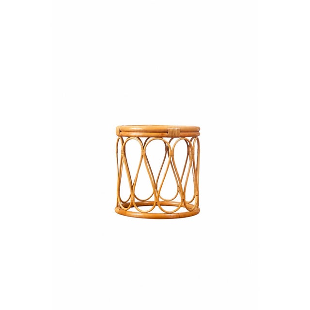 Bring warmth and natural elegance into your space with this handcrafted rattan side table. Made from high-quality natural...
