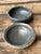 This set of two vintage studio pottery bowls epitomizes the minimalist elegance of mid-century hand-crafted ceramics. Each...