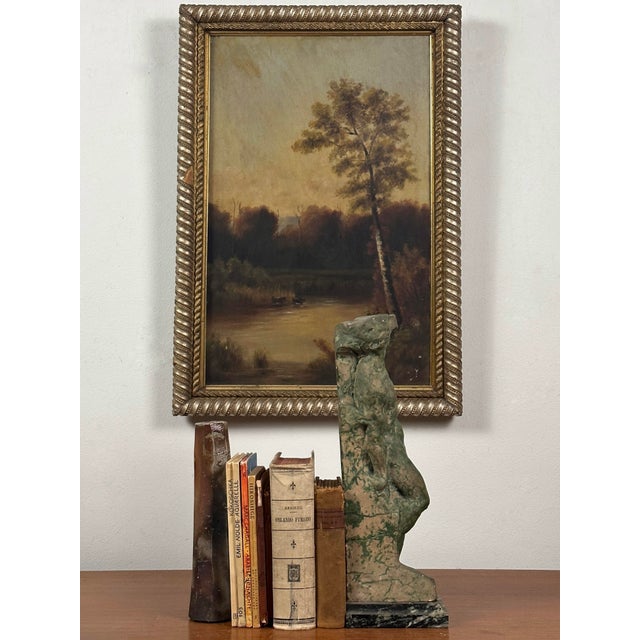 Antique Sunset Landscape with Lake and Cows, Oil on Canvas. Sunset landscape with two cows in the background wading in the...