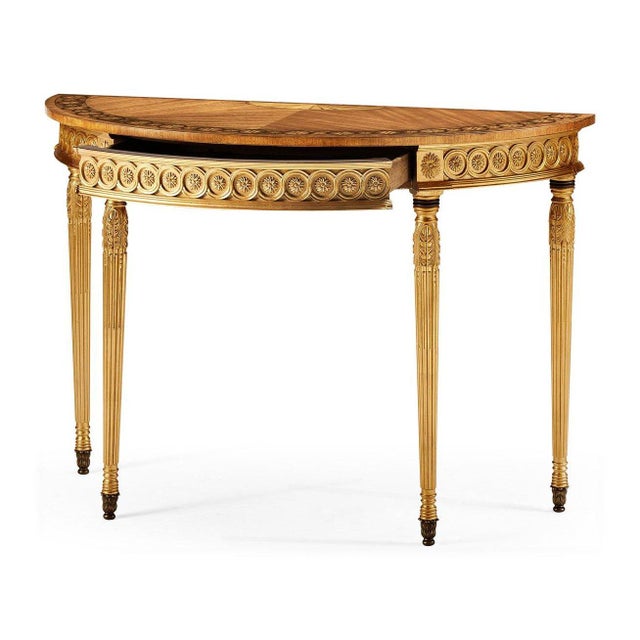 The Giltwood Demi-Lune Console reflects late 18th-century English design, drawing inspiration from the Adam style and a...