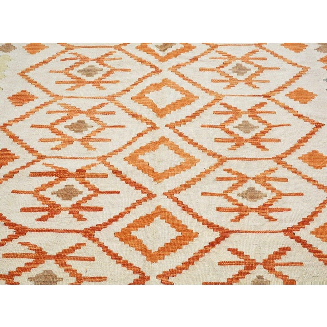 Flatweaved with care using traditional rug-making techniques, this wool rug blends timeless craftsmanship with a modern...