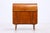 Vintage secretary desk with a classic roll-top and clean mid-century design. Behind the roll-top is a neatly organized...