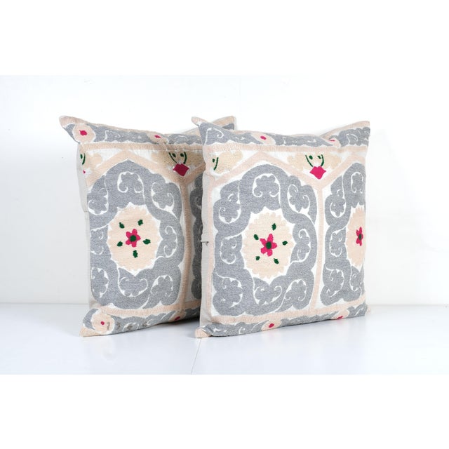 Gray Suzani Embroidery Throw Pillow Cover - A Pair Elevate your home decor with our Turkish Suzani Pillow Cover, featuring...