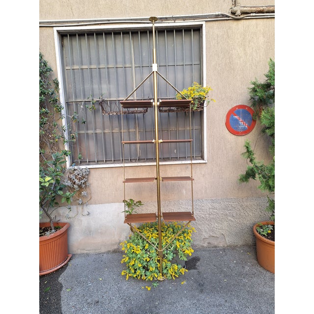 Floor-to-Ceiling Bookcase in Brass and Wood from Fedele Papagni, in Very Good conditions. Designed 1990 to 1999 I have...