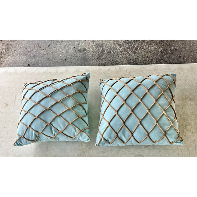 Bring a touch of elevated coastal luxury to your space with this accent pillow with hand tied rope. Meticulously...