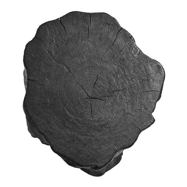 Solid lychee wood stump stool or side table. Attractive modern black finish subtly highlighting the natural wood grain....
