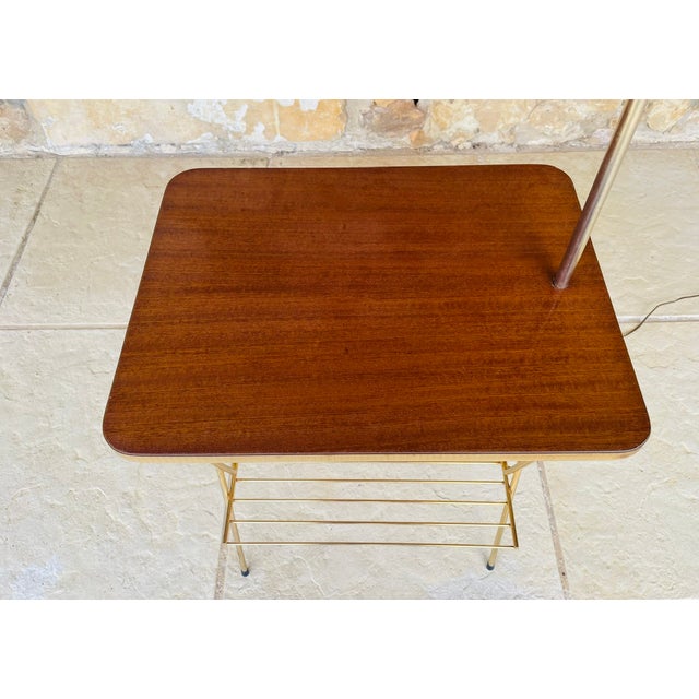 Mid-Century floor Lamp with integrated side table, from the 1960's. Side table has a glossy, formica top, with a "faux...
