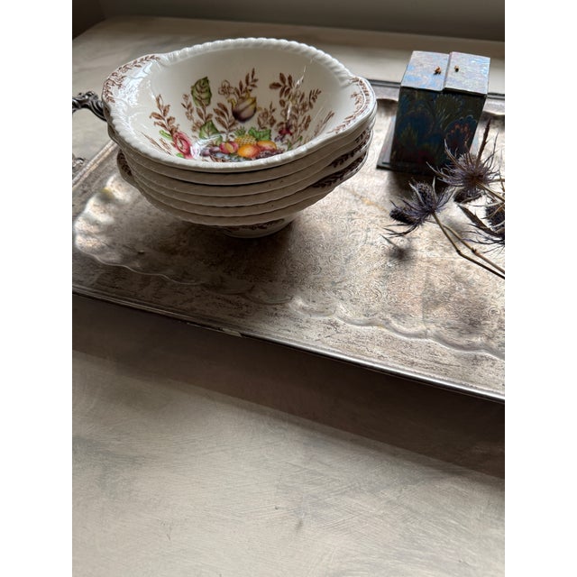 A charming set of six vintage English bowls from Johnson Bros., England, in the beloved “Pomona” pattern — part of their...